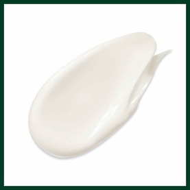 AVEDA Botanical Repair Strengthening Conditioner creamy white texture swatch on dark green background, 40ml