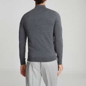 Model wearing Reiss Blackhall Funnel Neck Sweater in grey, shown from the back, styled with light grey trousers