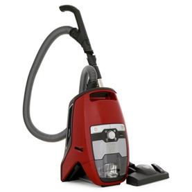 Miele Blizzard CX1 Cat & Dog Vacuum Cleaner in red, bagless canister design with flexible hose and floor nozzle attachment