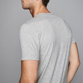 Model wearing Reiss Bless Regular Fit T-Shirt in grey marl, rear view showing round neckline and short sleeves