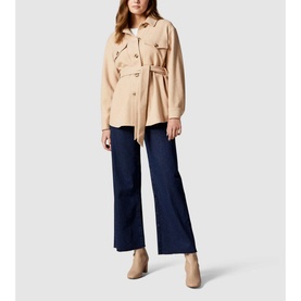 Model wearing Forever New Rosie Belted Shacket in brown with navy wide-leg trousers and beige ankle boots