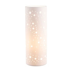 Belleek Starry Night Luminaire in cream porcelain, cylindrical table lamp with cut-out star pattern, glowing softly when lit