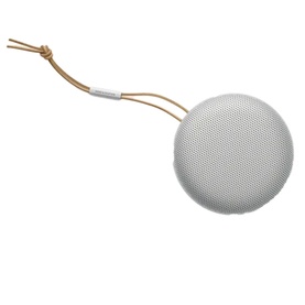 Bang & Olufsen Beosound A1 Gen 2 Grey Mist portable Bluetooth speaker with tan leather carry strap