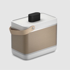 Bang & Olufsen Beolit 20 portable speaker in grey with champagne mesh grille, leather handle, and black True360 button top