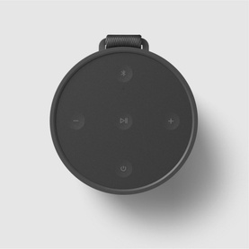Bang & Olufsen Beosound Explore portable Bluetooth speaker in black, overhead view showing control buttons and carry loop