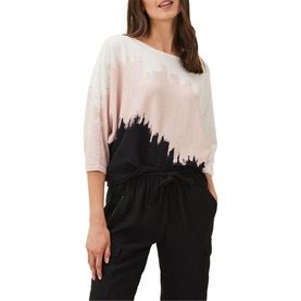 Model wearing Phase Eight Bertie Brushstroke Fine Sweater in pink with black brushstroke design, batwing sleeves, paired with black trousers