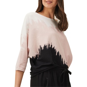 Model wearing Phase Eight Bertie Brushstroke Fine Sweater in pink with black brushstroke hem, batwing sleeves, styled with black drawstring trousers