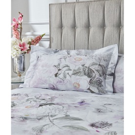 Bianca Amethyst 400 Thread Count Duvet Set in purple, featuring floral print with botanical motifs on bed with matching pillowcases