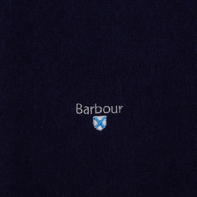 Barbour Lambswool Scarf in navy, close-up of embroidered logo and crest detail on fine knit fabric