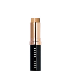 Bobbi Brown Skin Foundation Stick in Warm Natural, gold-toned cap, neutral beige bullet formula visible at tip
