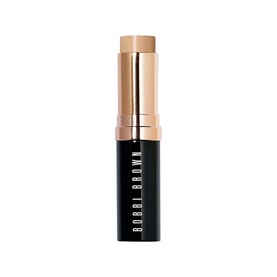 Bobbi Brown Skin Foundation Stick in Cool Honey, a neutral-toned twist-up stick with gold cap