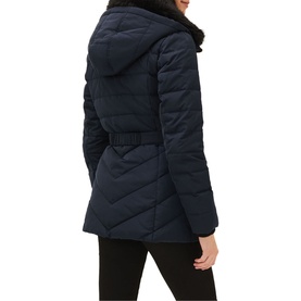 Model wearing Phase Eight Bobbie Short Puffer Coat in blue, rear view, showing quilted panels, belted waist, and faux fur collar hood