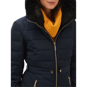 Model wearing Phase Eight Bobbie Short Puffer Coat in blue, close-up showing gold zip, quilted fabric and detachable faux fur collar
