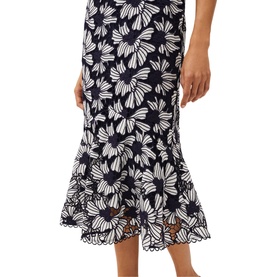 Model wearing Phase Eight Caitlyn Guipre Lace Dress in blue, showing midi-length peplum hem with white floral lace detailing