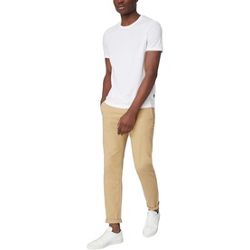 Model wearing Boss Black Casual Tiburt 55 T-Shirt in white, styled with tan chinos and white trainers