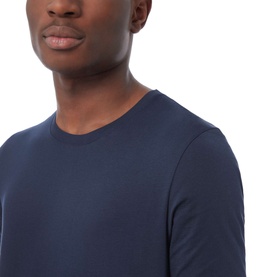 Model wearing Boss Black Casual 55 Tiburt Crew Neck T-Shirt in navy, close-up showing crew neckline and long sleeves