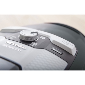 Miele Blizzard CX1 Excellence PowerLine Bagless Vacuum Cleaner in grey, close-up of suction power dial and control panel