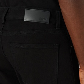 Boss Black Casual Maine Mid Rise Straight Leg Jeans in black, close-up of back pocket with branded leather patch detail