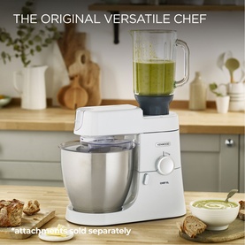 Kenwood Chef XL 6.7L 1200W Food Mixer in white with stainless steel bowl and blender attachment, styled in a kitchen setting.