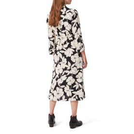 Model wearing Hobbs Chiara Floral Shirt Dress in black and white large floral print, midi length, long sleeves, styled with black ankle boots