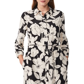 Model wearing Hobbs Chiara Floral Shirt Dress in black and cream large floral print, with long sleeves, shirt collar, and tie waist