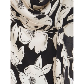 Hobbs Chiara Floral Shirt Dress in black and ivory, close-up of large floral print viscose fabric with draped detail