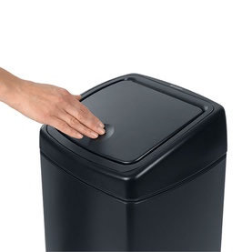 Brabantia Touch Rectangular Bin in black, with a hand pressing the touch-open lid to demonstrate the opening mechanism