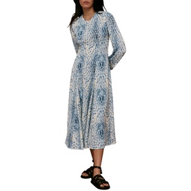 Model wearing Whistles Brushed Front Zip Dress in blue abstract print, midi length, long sleeves, styled with black sandals