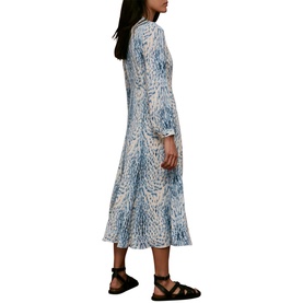 Model wearing Whistles Brushed Front Zip Dress in blue abstract print, midi length, long sleeves, styled with black strappy sandals