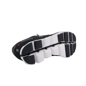 On Running Cloud Trainers in black, sole view showing white CloudTec pod cushioning system and black outsole