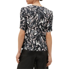 Model wearing Phase Eight Bryony Print Top in multi abstract print, showing ruched short sleeves and round neck, styled with black trousers