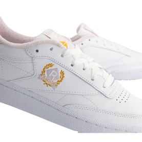 Reebok Club C 85 Trainers in white leather with gold embroidered crest logo, lace-up fastening and white cupsole