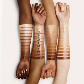 Charlotte Tilbury Hollywood Flawless Filter shades 1 to 7 swatched across three arms showing fair, medium and deep skin tones