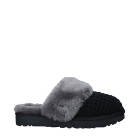 UGG Australia Cozy Slipper in black knit with grey fluffy sheepskin trim, rubber sole, side profile view