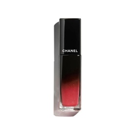 CHANEL Ultrawear Shine Liquid Lip Colour in a black gradient glass bottle with deep red liquid visible through the base