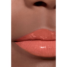 Chanel Ultra Wear Liquid Lip Colour in Beige Chic 164, shown on lips with a glossy, warm nude-peach finish