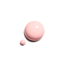 Chanel Le Vernis nail varnish swatch in soft pastel pink, shown as a large droplet and small dot on white background.