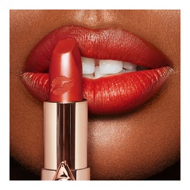 Charlotte Tilbury Hot Lips 2.0 Refill lipstick in Red Hot Susan, shown against model's lips with a glossy red finish