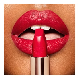 Charlotte Tilbury Hot Lips 2.0 Refill lipstick in Patsy Red, shown applied on lips with bullet detail visible