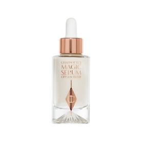 Charlotte Tilbury Magic Serum Crystal Elixir in a clear glass dropper bottle with rose gold cap and crystal-faceted base.