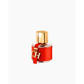 Carolina Herrera CH Woman Eau de Toilette in red leather-wrapped bottle with gold cap and CH charm pendant
