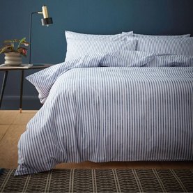 Content by Conran Chelsea Duvet Set in navy, white ticking stripe, styled on a double bed with matching pillowcases