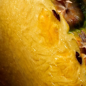 Creed Aventus Eau de Parfum, men's fragrance, shown with close-up of fresh pineapple, a key note in the scent