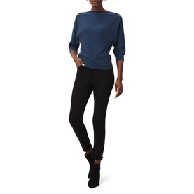 Model wearing Phase Eight Cristine Slash Knit in blue with elbow-length sleeves, styled with black slim-fit trousers and ankle boots
