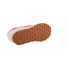 Nike Daybreak Trainers in white, sole view showing tan rubber outsole with multi-directional tread pattern and pink accent detailing