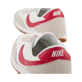 Nike Daybreak Trainers in white with red swoosh, grey suede overlays, and gum sole, shown from heel and toe angle