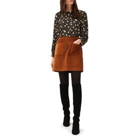 Model wearing Phase Eight Daizy Ditsy Print Jersey Top in multi floral print, styled with tan cord mini skirt and black knee-high boots