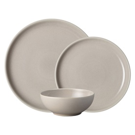 Denby Intro 12-Piece Tableware Set in beige stoneware, showing two plates and a bowl with matte glazed finish