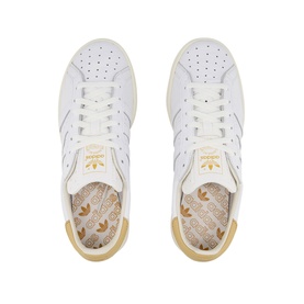 Adidas Earlham Trainers in white leather with gold heel tab and tonal laces, top-down view showing branded insole