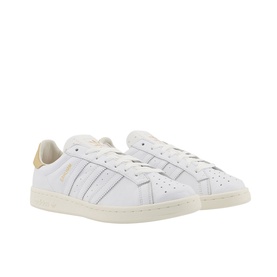 Adidas Earlham Trainers in white leather with gold heel tab, three stripe detailing, and cream rubber sole